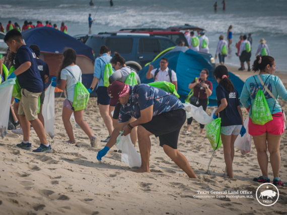 Volunteers remove trash from South Padre Island beaches during the 2025 Adopt-A-Beach Coastwide Spring Cleanup