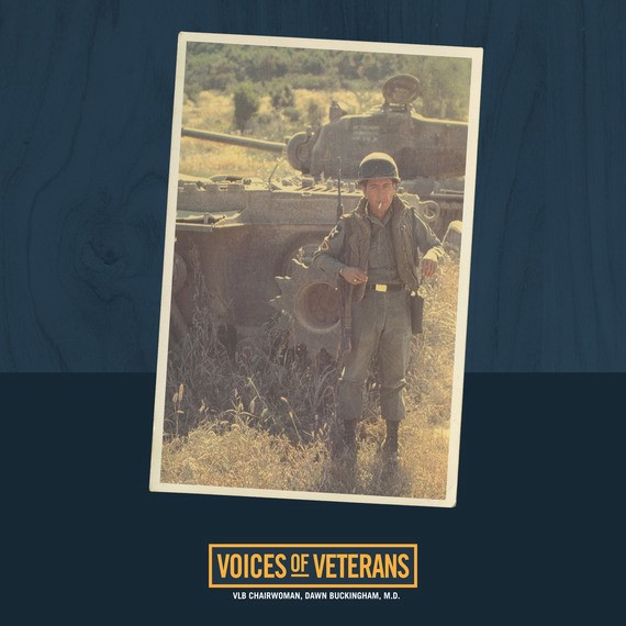 Voices of Veterans: SP5 George Padilla U.S. Army Veteran in front of military tank