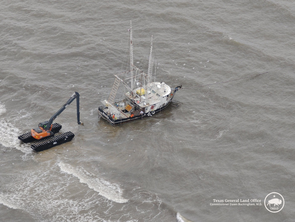 An aerial image of the 56' shrimp boat being removed from Crystal Beach, Wednesday, May 27, 2026