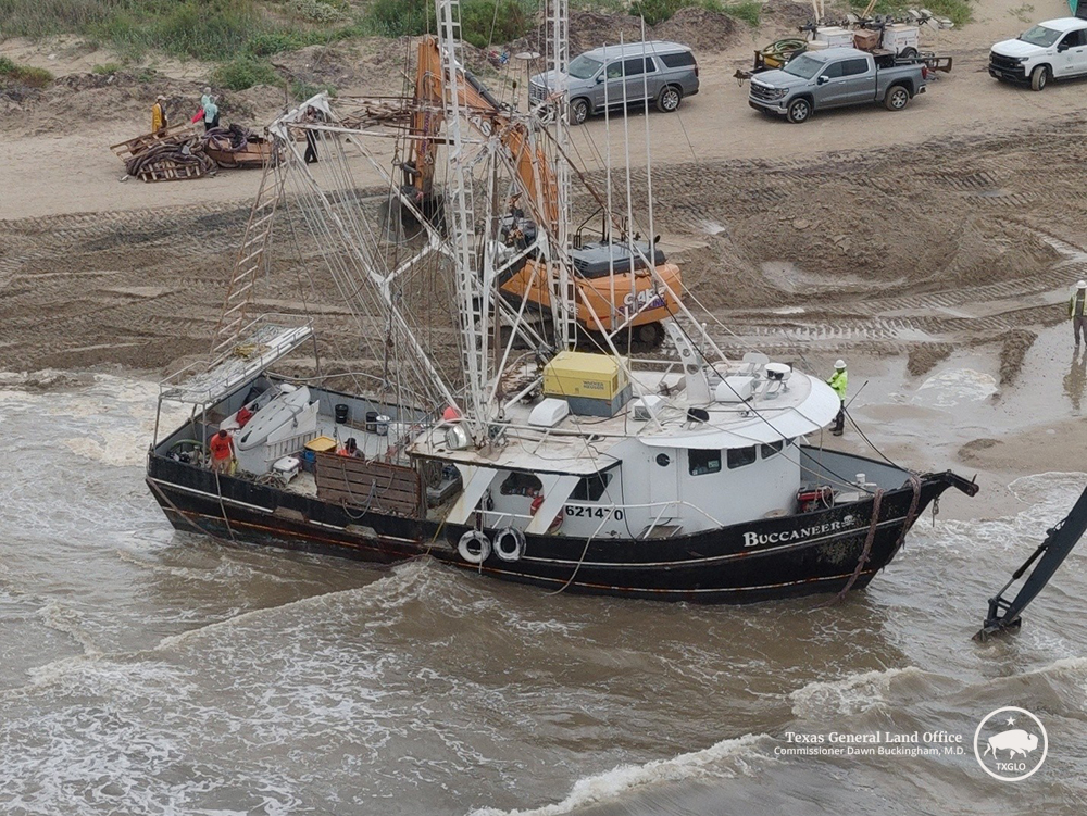 An aerial image of the 56' shrimp boat being removed from Crystal Beach, Wednesday, May 27, 2026